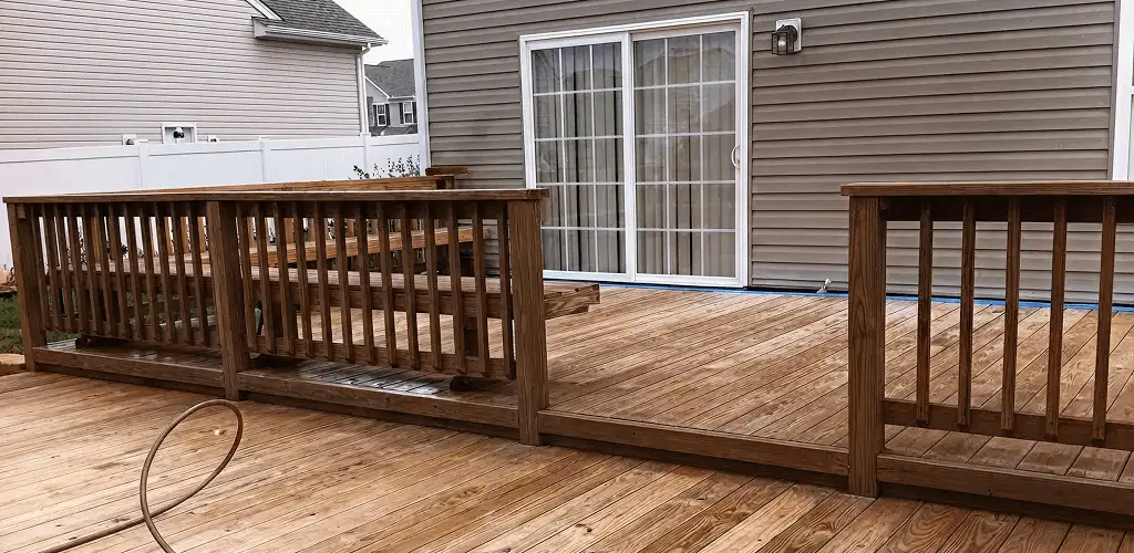 Deck sealing service protecting a backyard wood deck and railings in Cincinnati, OH