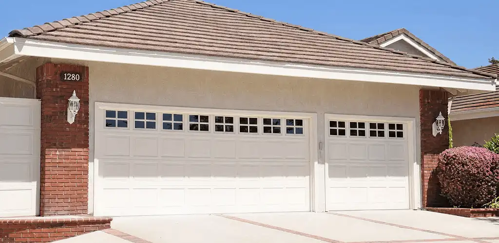 Residential garage door repair service for a double garage door in Cincinnati, OH