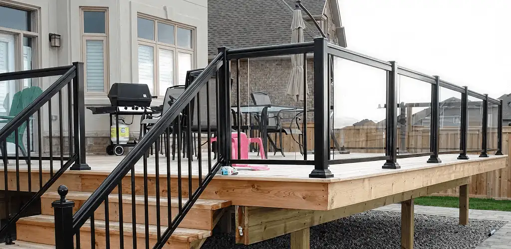 Handrail installation on a deck staircase for safety and code compliance in Cincinnati, OH