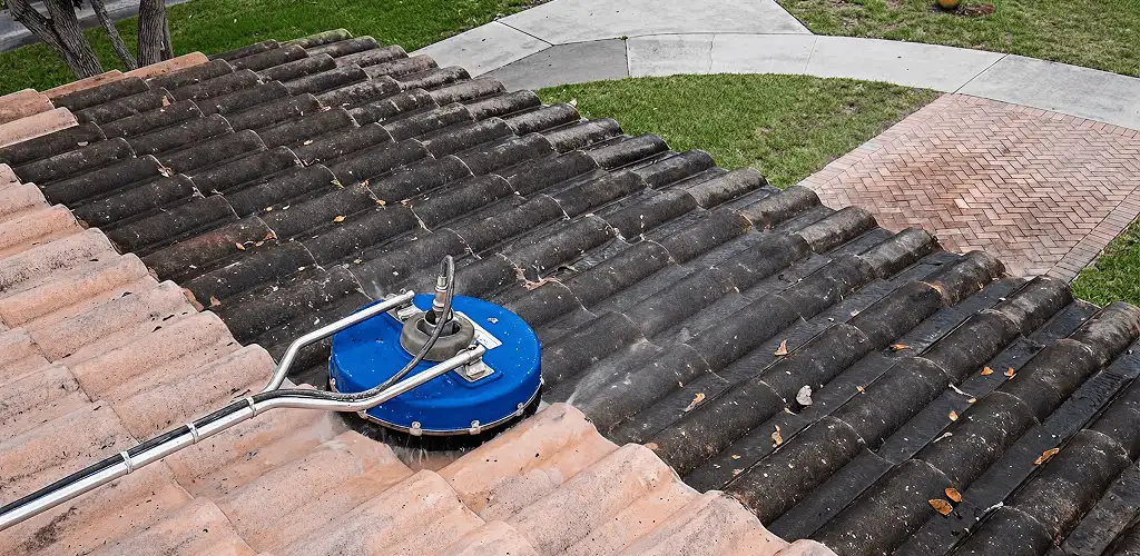 Roof pressure cleaning removing debris and buildup from roof tiles in Cincinnati, OH